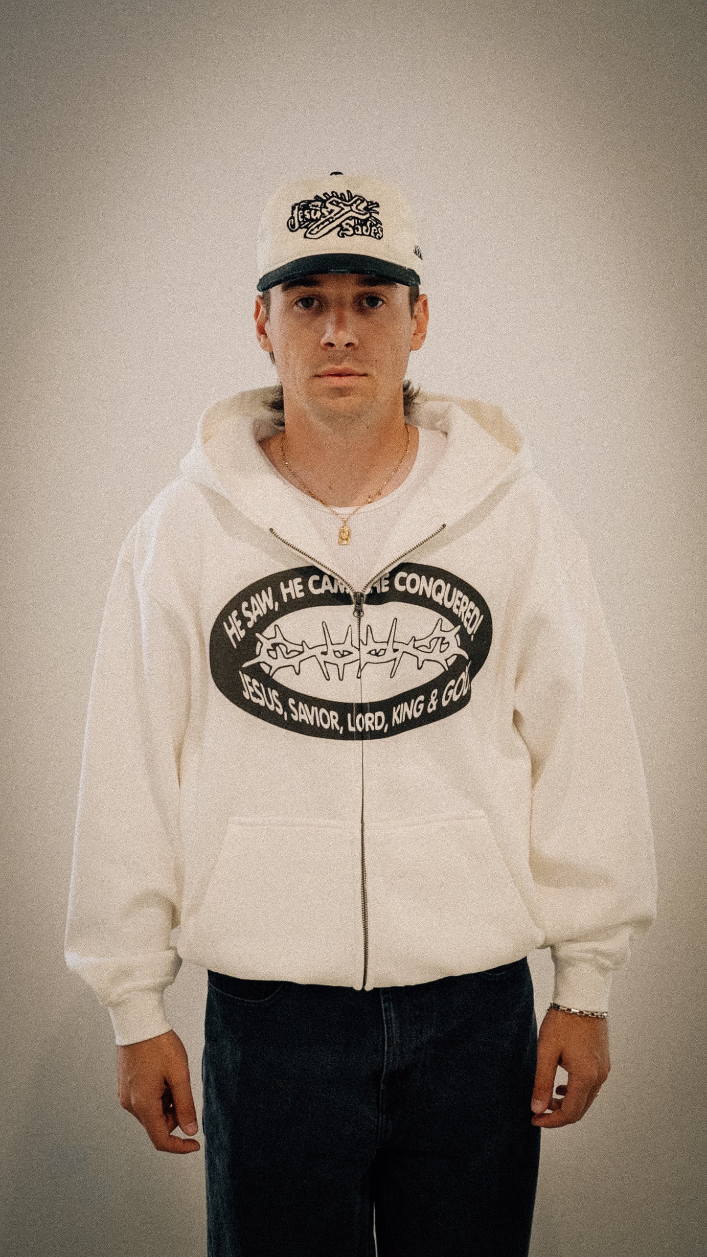 "HE CONQUERED" zip up